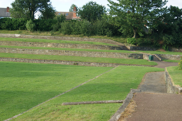 Some tiered steps in a park.